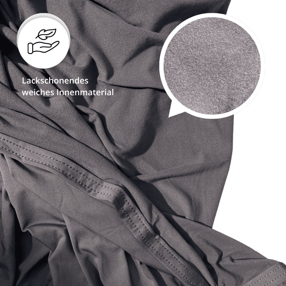 Weiches, lackschonendes Innenmaterial der schwarzen Perfect Stretch Autoabdeckung in Detailaufnahme